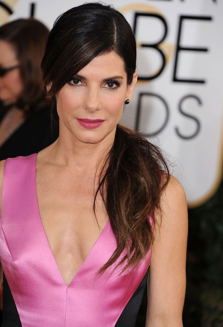 Not many do a side pony better than __Sandra Bullock__, and her chic makeup, with that impactful dus...