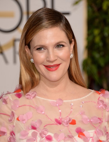 __Drew Barrymore__’s long hair, combed smoothly with a low side part, was so pretty but subtle, allo...