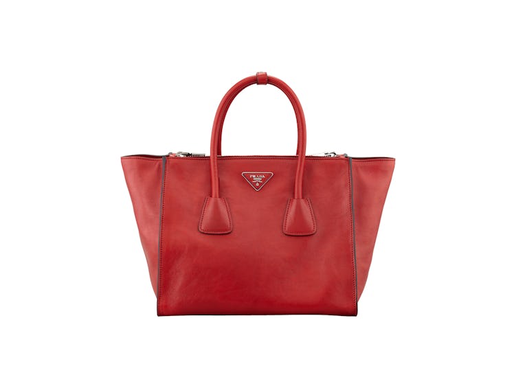Prada tote bag, $2400, [neimanmarcus.com](http://www.neimanmarcus.com/Prada-Glace-Calf-Twin-Pocket-T...