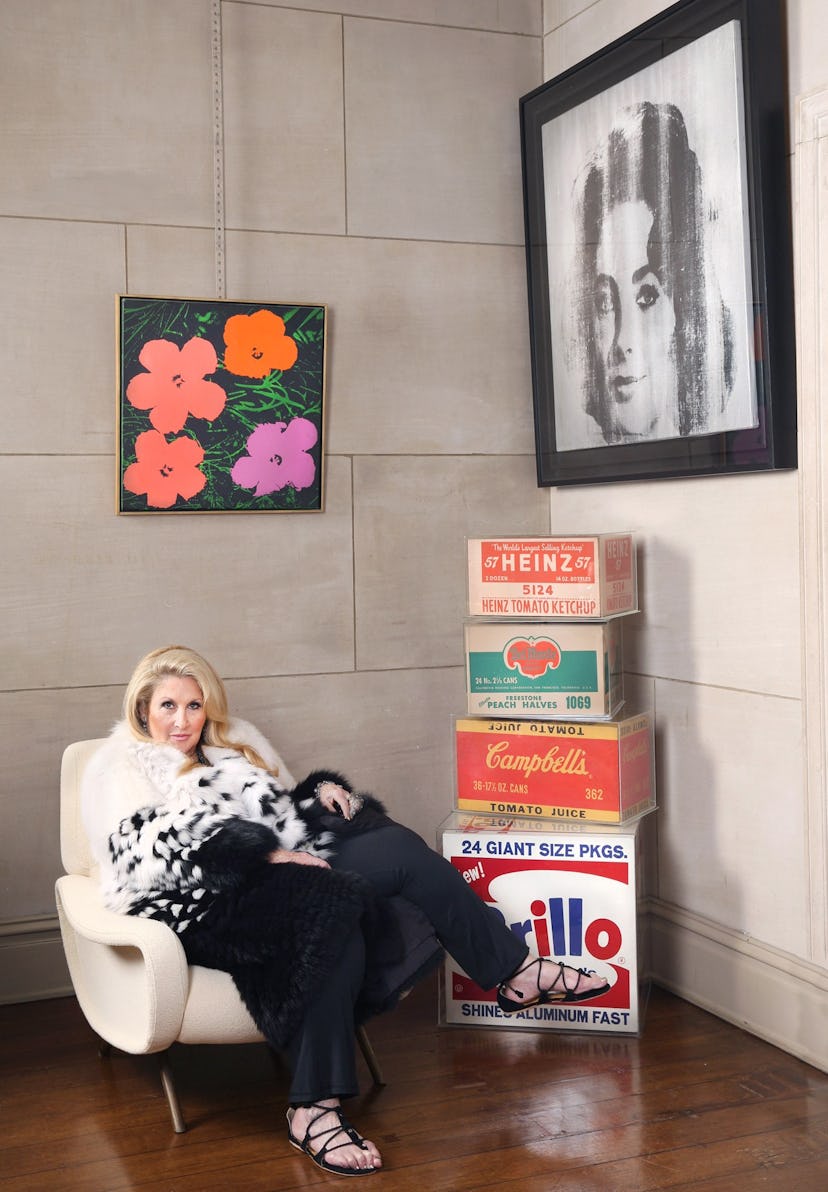 Jane Holzer at home, surrounded by some of her favorite Warhol pieces.