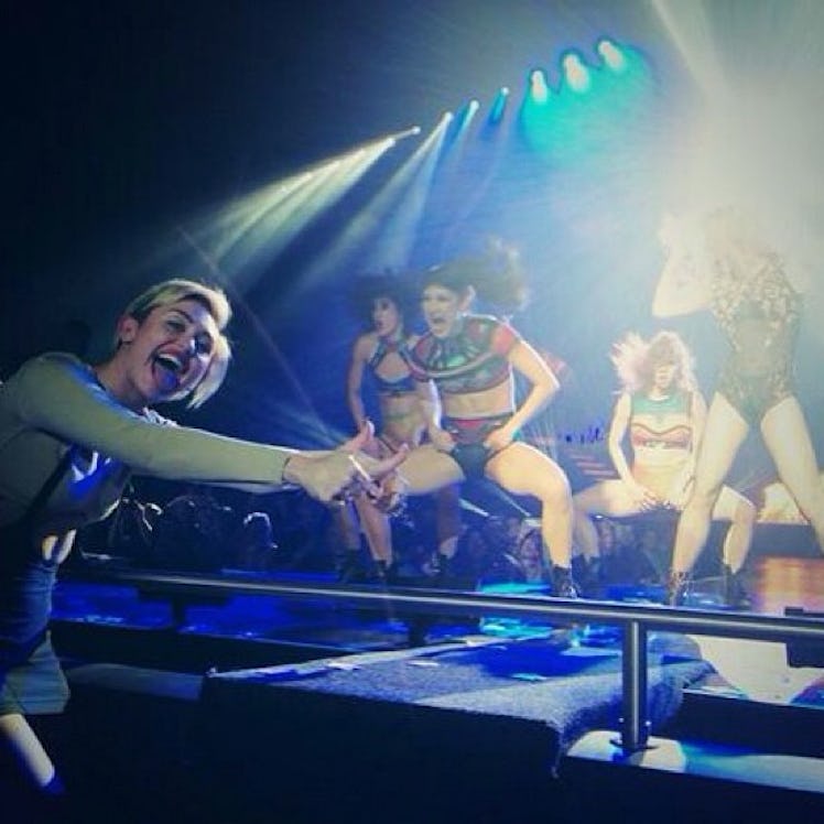 __#SuperFan:__ Cyrus couldn’t control her excitement to be front row center at kick off of Britney S...