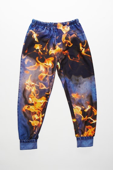 Korakrit Arunanondchai’s flame-printed denim sweats