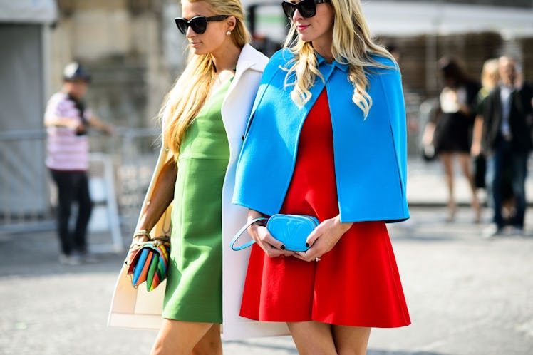 Nicky and Paris Hilton attend Paris Fashion Week Spring 2015 Day 8