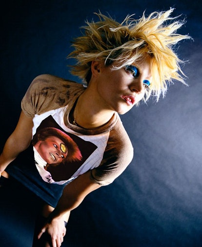 Kate Moss with Ziggy t-shirt, New York 2002 by Mick Rock