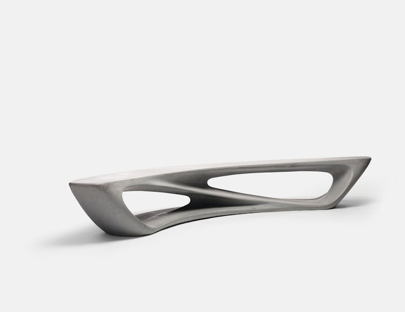 Amanda Levete’s poured concrete and white limestone driftwood bench
