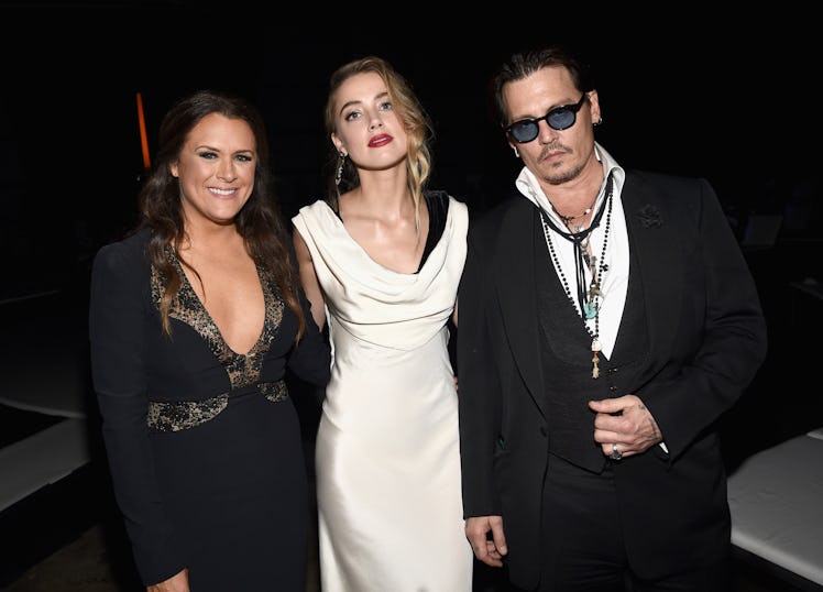 Founder of The Art of Elysium Jennifer Howell and actors Amber Heard and Johnny Depp