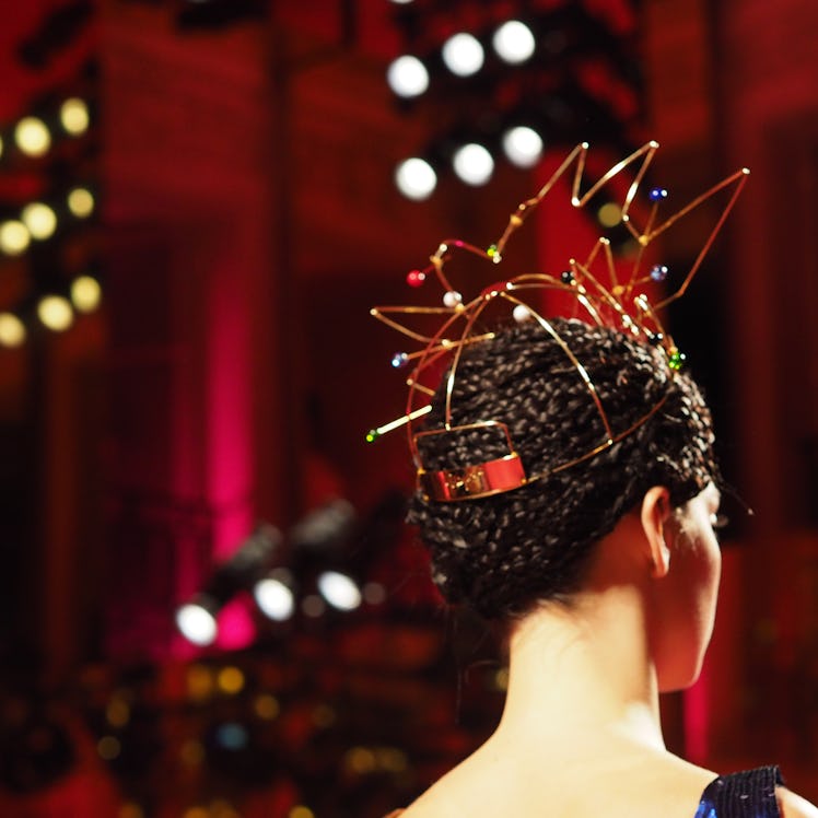 A golden headpiece at Schiaparelli Spring 2015 couture