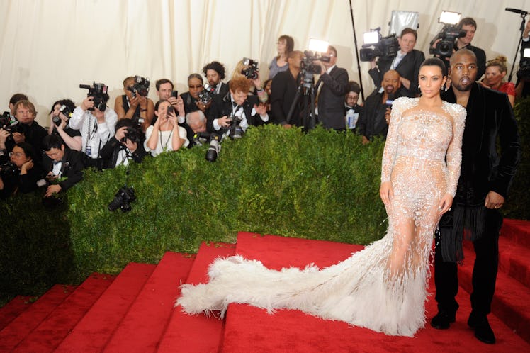 Kim Kardashian in Roberto Cavalli with Kanye West