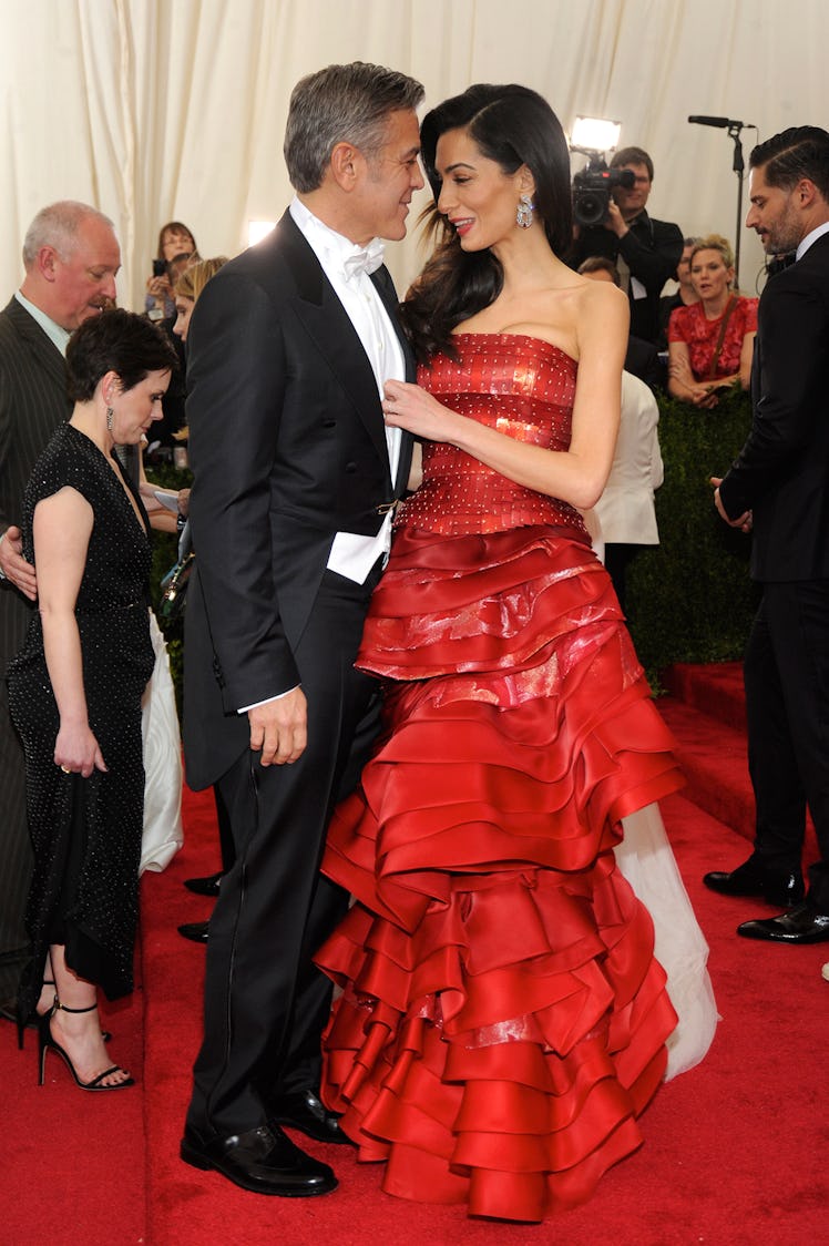 George Clooney in Georgio Armani and Amal Clooney in Margiela