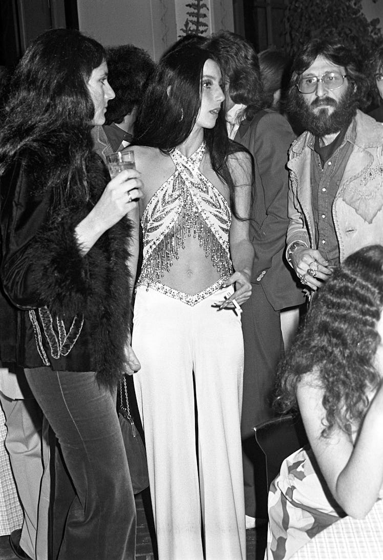 Cher wearing a halter top