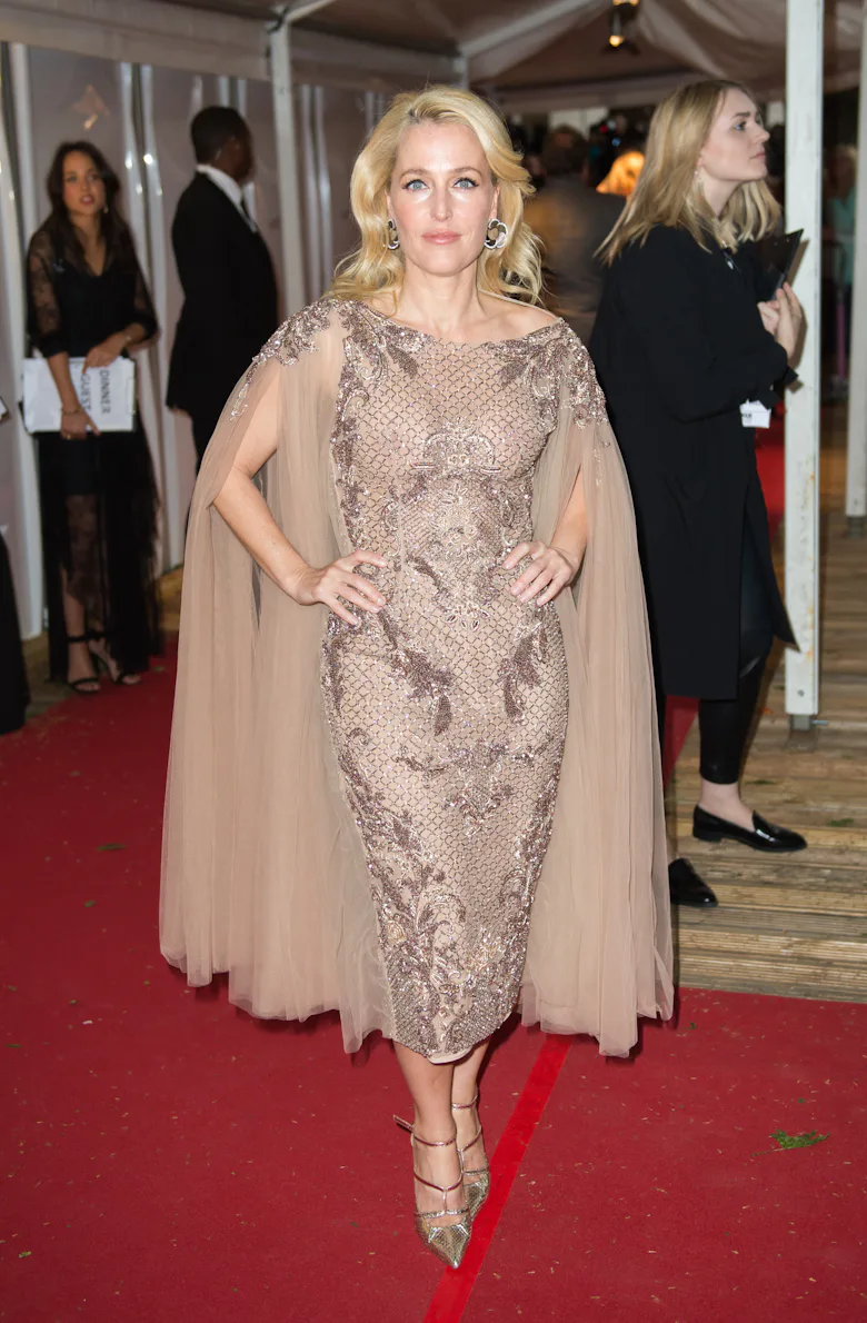 Gillian Anderson's Best Red Carpet Looks, From Sultry Gowns to Classic Menswear Gillian Anderson's Best Red Carpet Looks, From Sultry Gowns to Classic Menswear