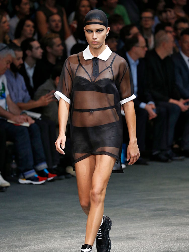 Adriana Lima walking the runway for Givenchy Spring 2015