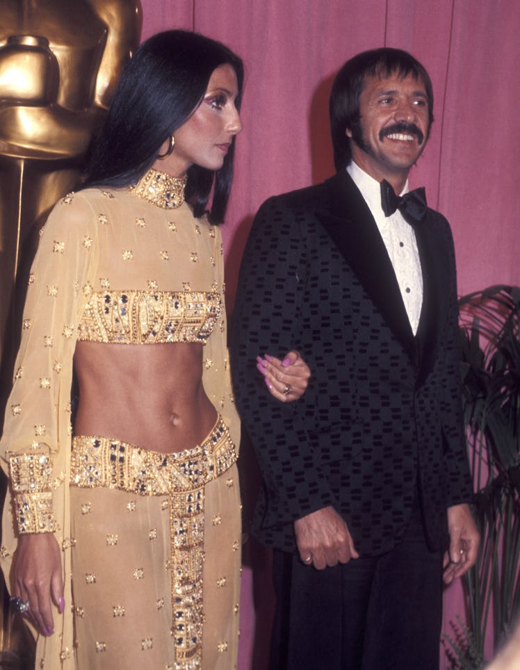 Cher in a golden Bob Mackie top and dress at the 45th Annual Academy Awards in 1973