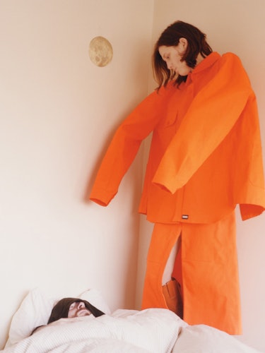 Maud Escudie wearing the orange Vetements set.