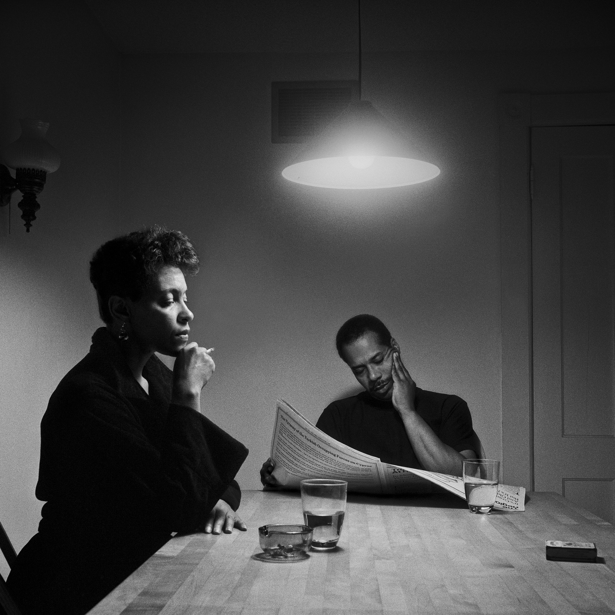 Revisit Carrie Mae Weems Enduring Kitchen Table Series   585323dc57dfc3b0230f658c Untitled Man Reading Newspaper A 