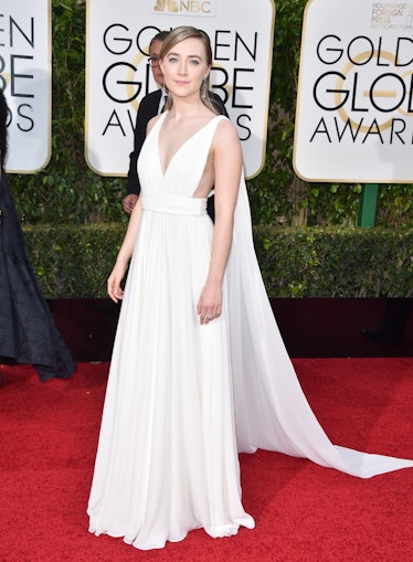 Saoirse Ronan posing in a white gown at the 63rd annual Golden Globes red carpet