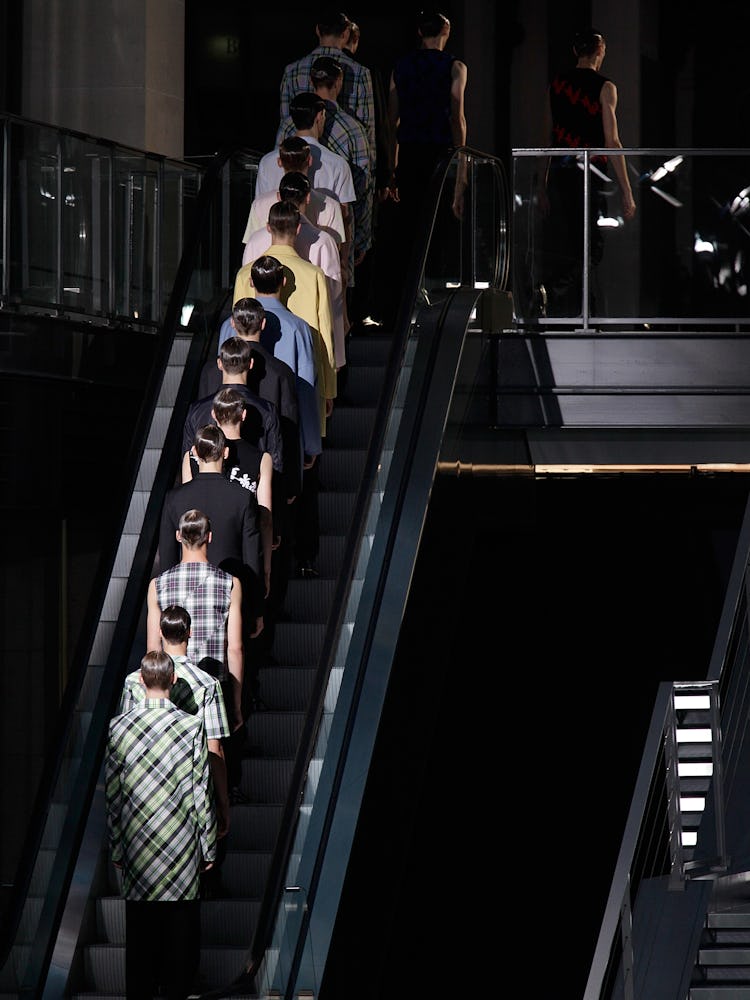 Models during Raf Simons Spring 2012 fashion show in Paris