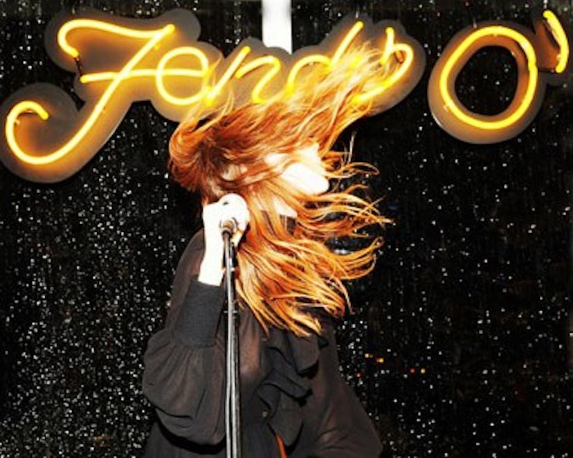 blog-Lykke-Li-%28wearing-FENDI%29-performance-with-neon-sign.jpg