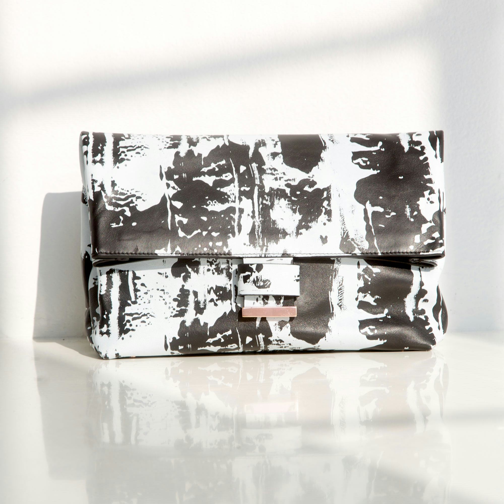 Cédric Charlier multicolored clutch, $595, [shopbop.com](http://www.shopbop.com/multi-colored-clutch...