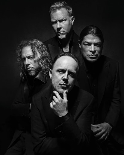 Black and white photo of Metallica's members in Brioni suits 