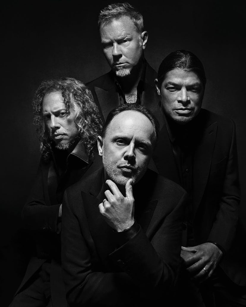Black and white photo of Metallica's members in Brioni suits