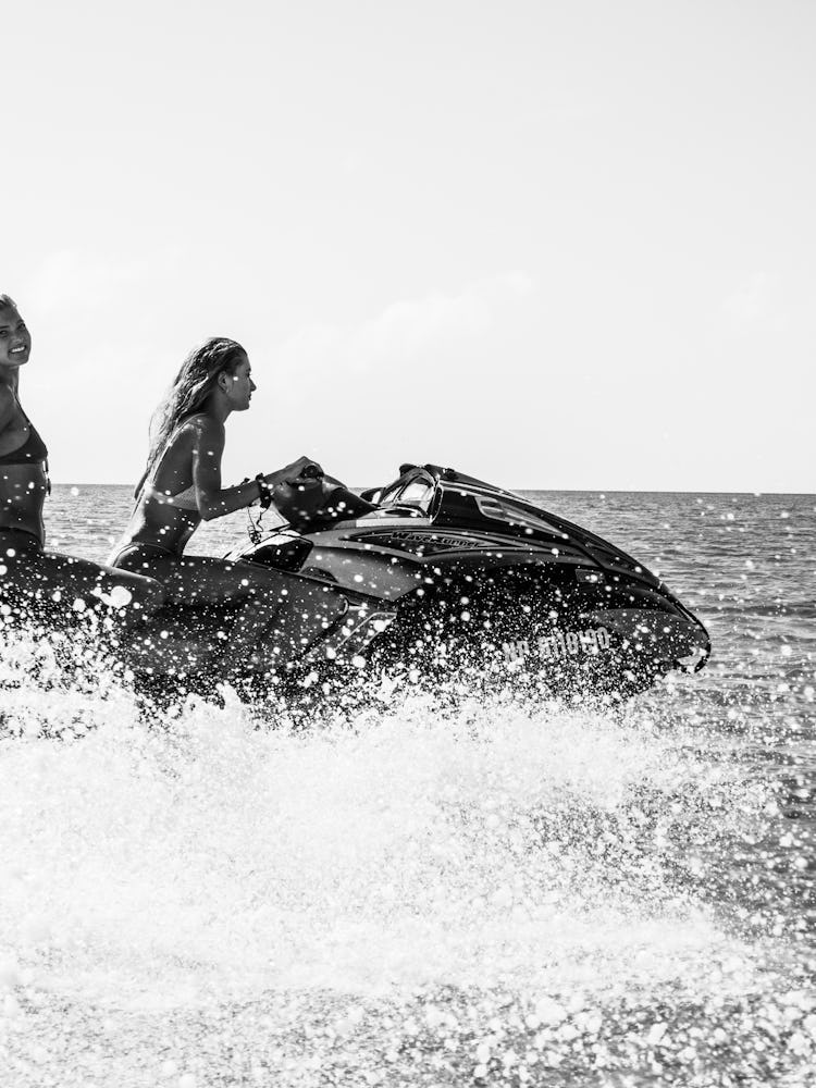 Two influencers on a jet ski promoting Fyre Festival