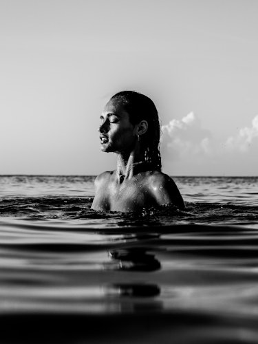 A model posing in a pool for a series of photos from “Fyre Cay” in the Bahamas promoting the Fyre Fe...