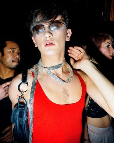 Aman in a red tank top, Christian Dior bag and sunglasses at Ova the Rainbow : Dagger X OVA NYE at t...