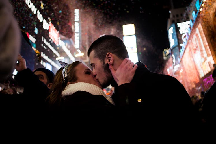 A couple kissing during the celebration of New Year’s Eve 2017 in the heart of Times Square