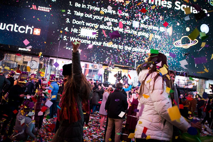 People dancing at Times Square during New Year's Eve 2017 celebration. 