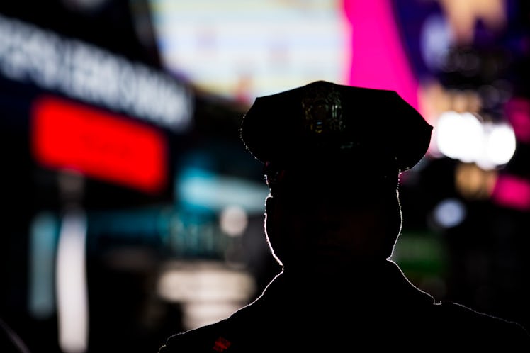 A police officer at Times Square during New Year's Eve 2017 celebration.