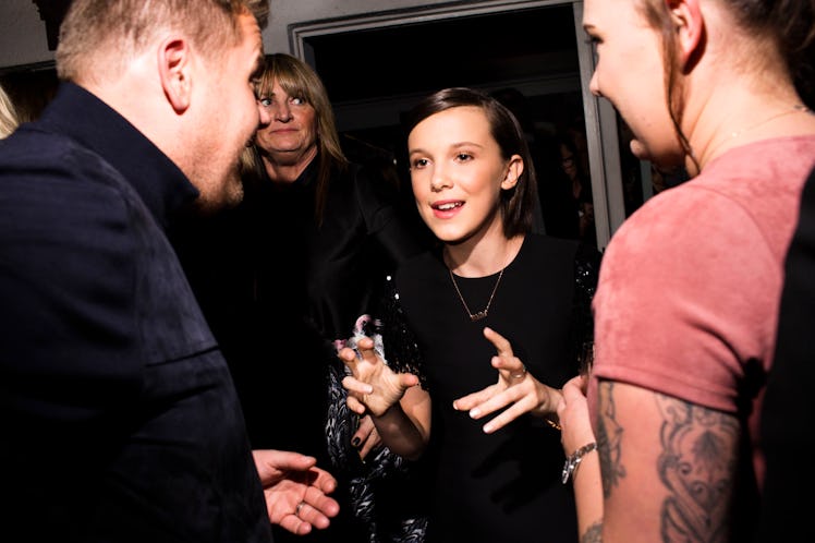 James Corden and Millie Bobby Brown talking at W's Golden Globes Party 