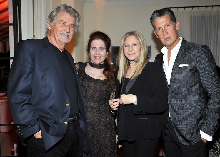 James Brolin, Lynn Hirschberg, Barbra Streisand and Stefano Tonchi posing for a photo at W's party 