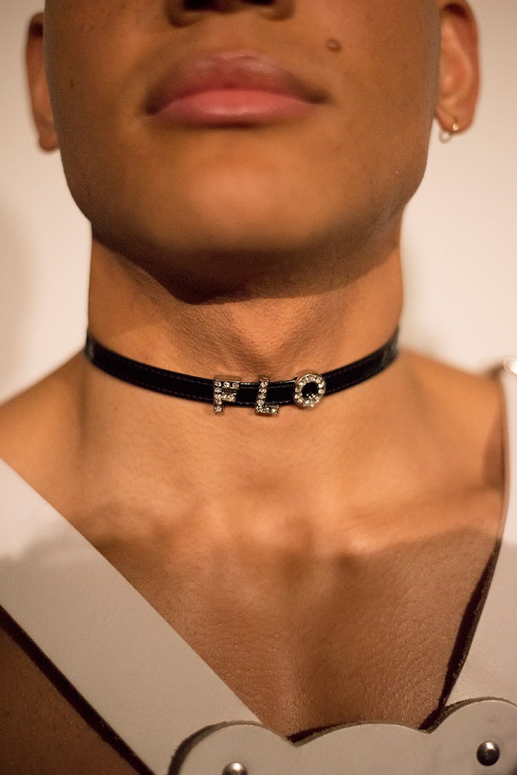 A model wearing a black men's choker necklace at London Fashion Week