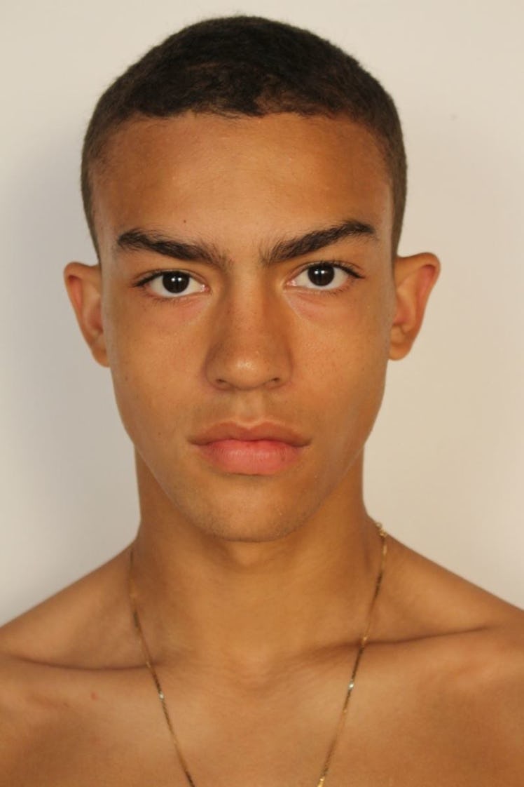 A male model Myles Gable posing for a photo