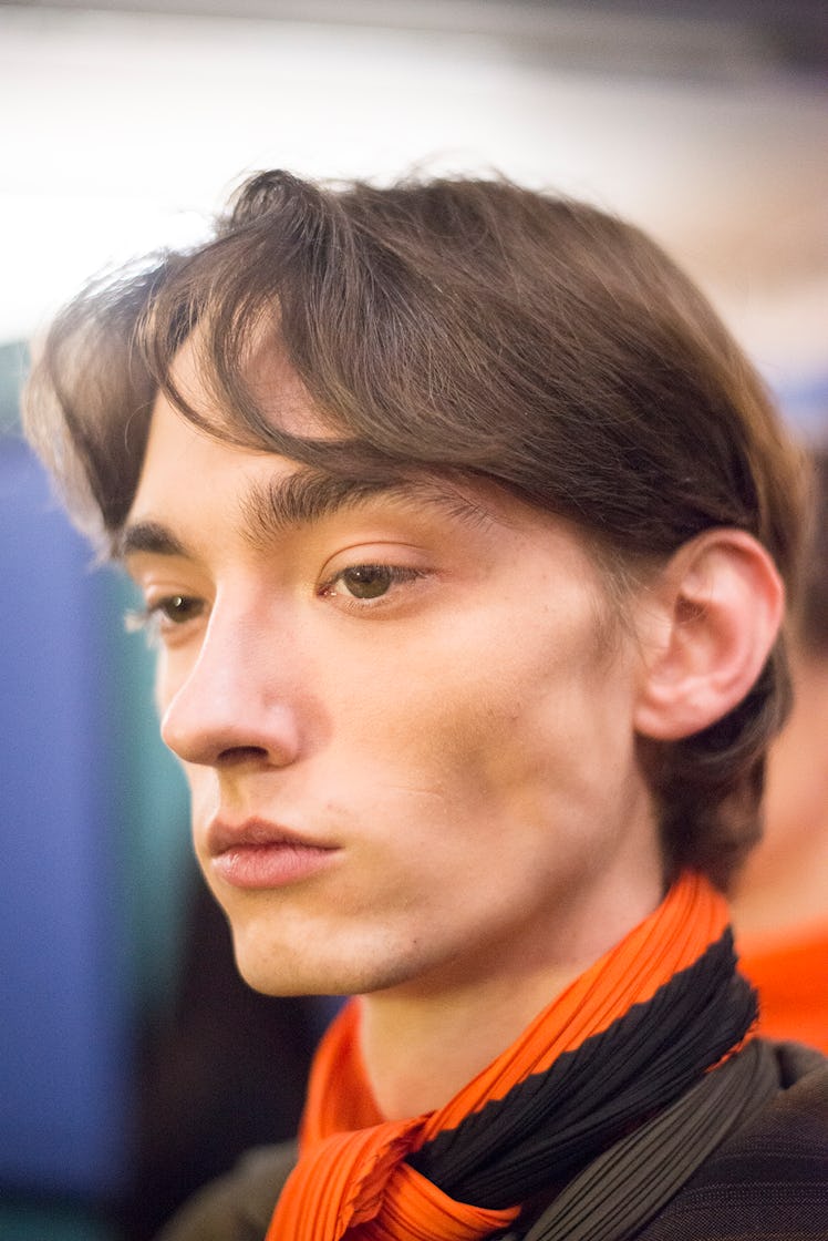 A model backstage at J.W. Anderson’s Fall/Winter 2017 fashion show.