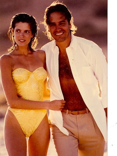 John Casablancas with a model on the beach