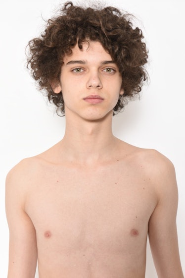 Up-and-coming male model, Andrei Dobrin, shirtless while posing for a photo.