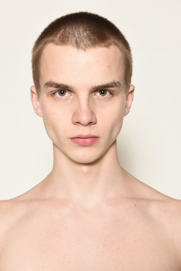 Up-and-coming male model, Ernest Klimko, posing for a photo.
