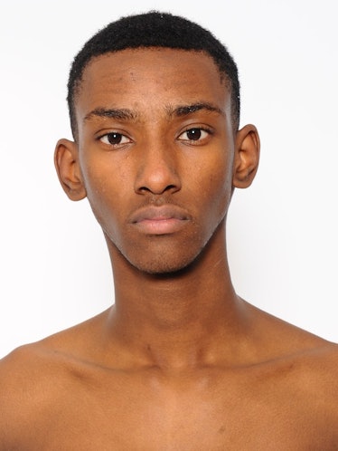 Up-and-coming male model, Myles Dominique, posing for a photo.
