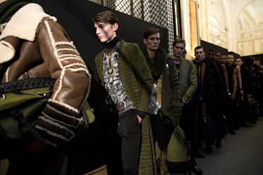 Models ready for the runway at Balmain Men’s Fall 2017.