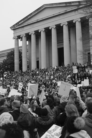 A large crowd gathered in front of the U.S. Capitol with various protest posters at the Women’s Marc...