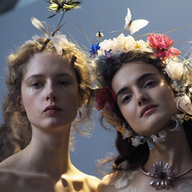 Models wearing floral headpieces during Christian Dior Haute Couture Spring 2017.
