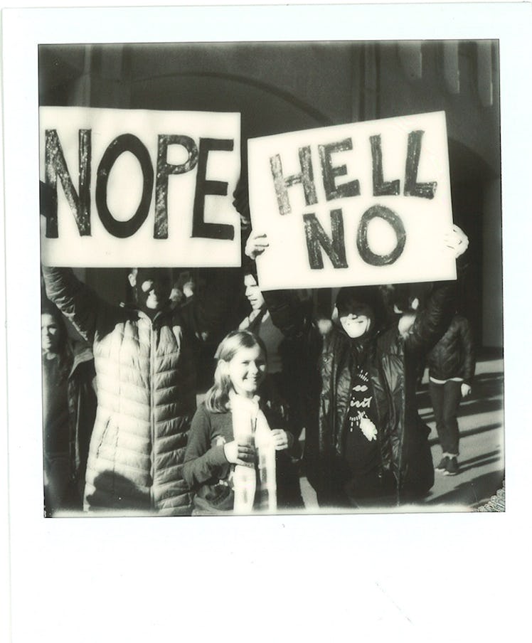 "NOPE" and "HELL NO" text sign posters at the Women’s March in NYC
