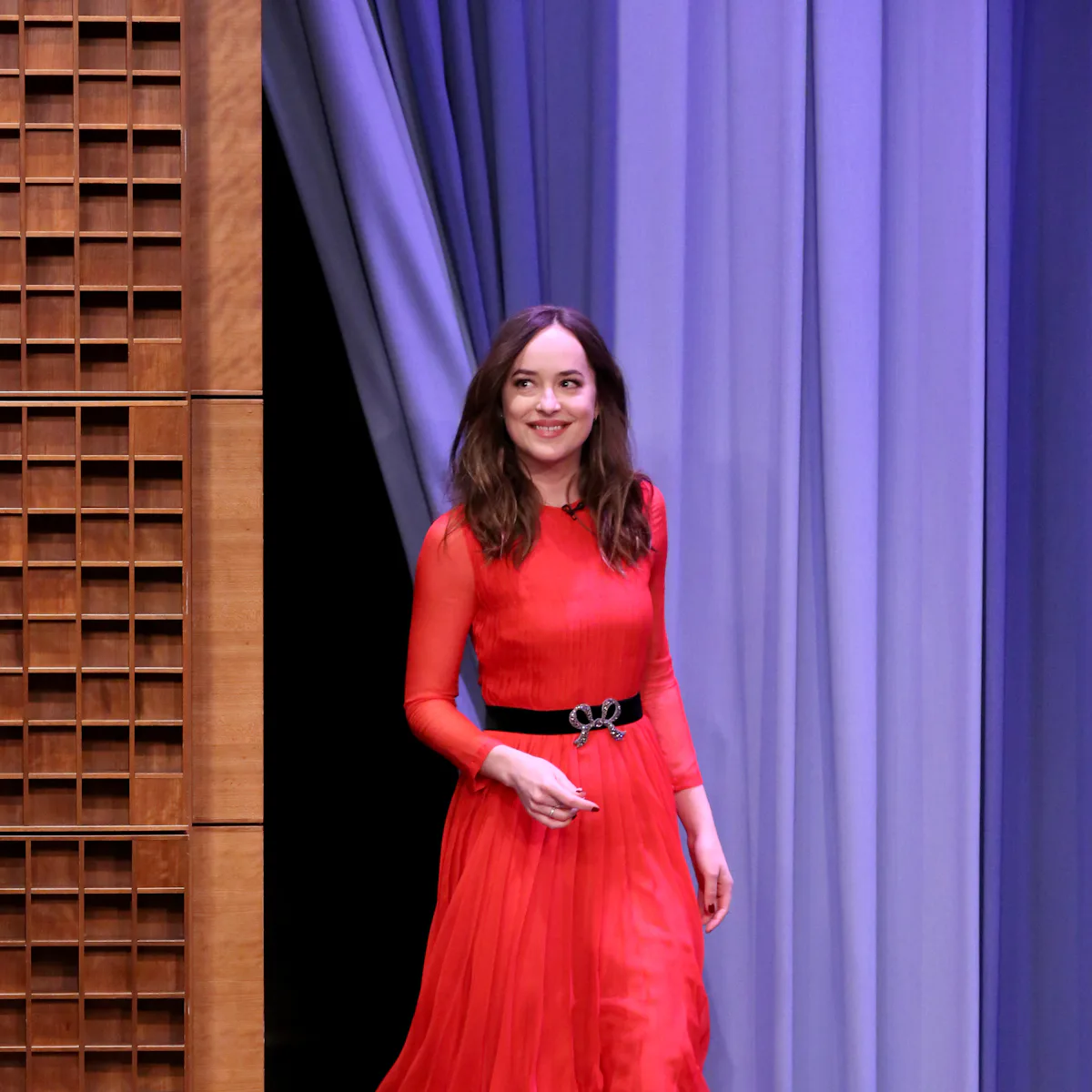 dakota johnson red dress fifty shades darker Dakota Johnson wore an Elie Saab Resort 2016 dress while in Paris to film the Fifty Shades series The Real My Royals