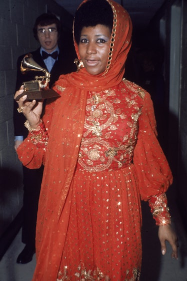 Aretha Franklin in a gold-embroidered red gown in 1970