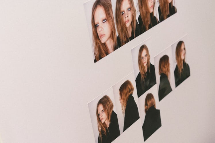 Ten close-up photographs of a red haired model on a white wall at the Alexander Wang Fall 2017 show