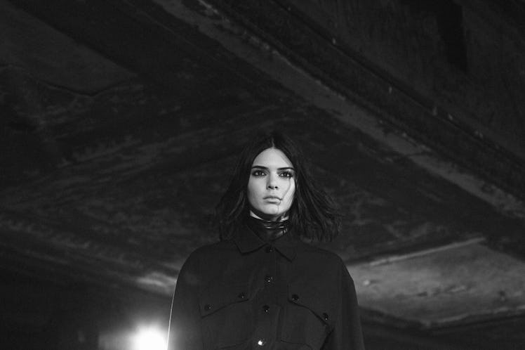 Kendall Jenner at Alexander Wang Fall 2017 fashion show in a black coat