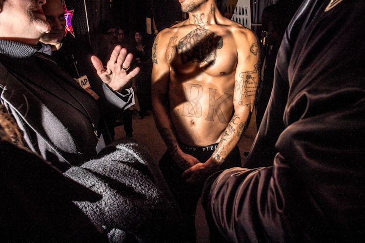 Jeremy Meeks shirtless backstage at Philipp Plein’s Fall 2017 fashion show during New York Fashion W...