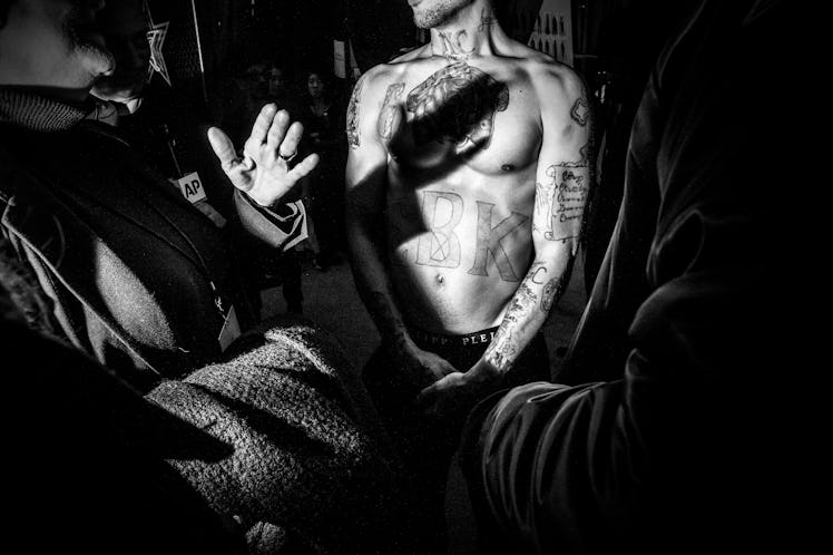 Shirtless Jeremy Meeks backstage at Philipp Plein Fall 2017